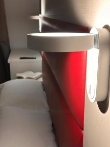 A bed or beds in a room at Hotel City 20