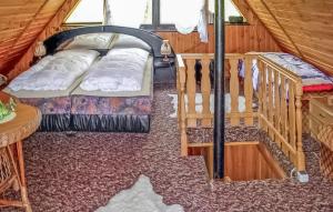 Postel nebo postele na pokoji v ubytování Ferienhaus Rheinsberg Ot Kagar