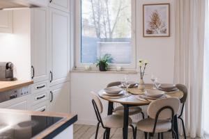 Kuchyňa alebo kuchynka v ubytovaní Garden Apartment Old Town
