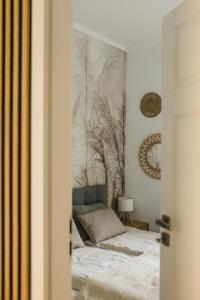 Posteľ alebo postele v izbe v ubytovaní Garden Apartment Old Town