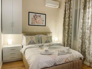 Letto o letti in una camera di AJ Apartments - Hidden Gem in front of Taiwan Center