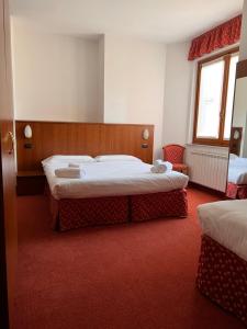 Postel nebo postele na pokoji v ubytování Fell Hotel
