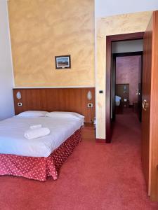 Postel nebo postele na pokoji v ubytování Fell Hotel + 3 fotografie
