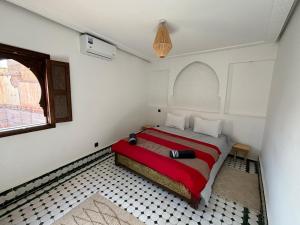 Postel nebo postele na pokoji v ubytování RIAD KS & SPA