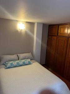 Postel nebo postele na pokoji v ubytování Apartamento Entero Sector Exclusivo De Zipaquira + 12 fotografií