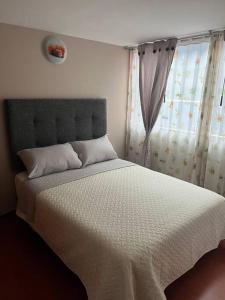 Postel nebo postele na pokoji v ubytování Apartamento Entero Sector Exclusivo De Zipaquira