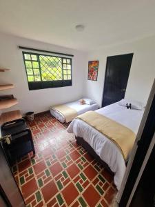 Postel nebo postele na pokoji v ubytování Escapada En La Quinta Esperanza