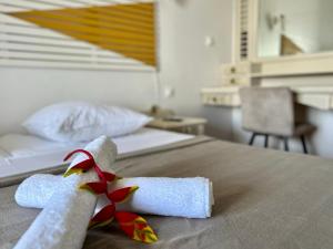 Un ou plusieurs lits dans un hébergement de l'établissement Appartements avec vue mer à Tartane