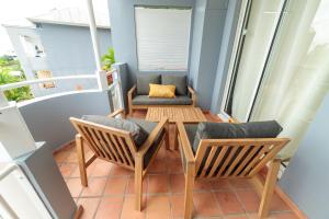 Coin salon dans l'établissement Appartements avec vue mer à Tartane