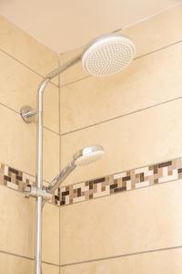 Salle de bains dans l'établissement Appartements avec vue mer à Tartane