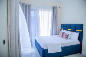 Postel nebo postele na pokoji v ubytování Hallaweeya&Bright