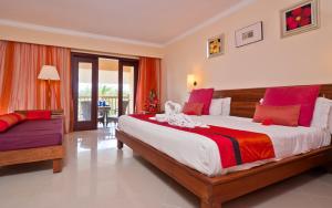 Voodi või voodid majutusasutuse Jalsa Beach Hotel & Spa toas