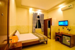 TV a/nebo společenská místnost v ubytování Gia Thanh Phu Quoc Guest House