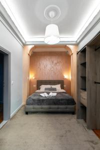 Ένα ή περισσότερα κρεβάτια σε δωμάτιο στο Aristotelous Family House