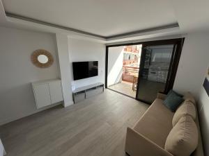 TV a/nebo společenská místnost v ubytování Luxury Danubio Ocean View