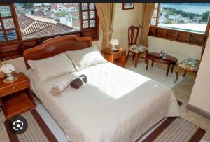 Hotel El Dorado Guatavita客房内的一张或多张床位