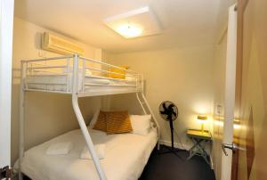Postel nebo postele na pokoji v ubytování Platinum Apartments - Unit 2