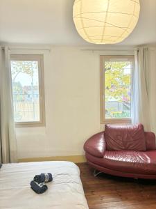 Voodi või voodid majutusasutuse Chambre Bugrane toas
