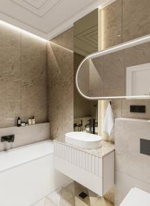 un baño con lavabo y espejo en Heaven Luxury Suites, en Belgrado 56 fotos más