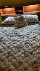 Giường trong phòng chung tại La Costa Mar De Ajo