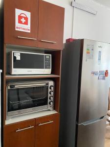 Kuchyň nebo kuchyňský kout v ubytování Hostal San Benito Chile