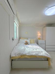 Postel nebo postele na pokoji v ubytování Rapym Coliving House