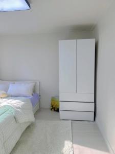 Postel nebo postele na pokoji v ubytování Rapym Coliving House