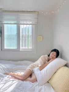 Postel nebo postele na pokoji v ubytování Rapym Coliving House