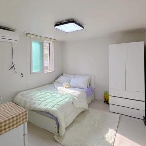 Postel nebo postele na pokoji v ubytování Rapym Coliving House