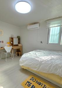 Postel nebo postele na pokoji v ubytování Rapym Coliving House
