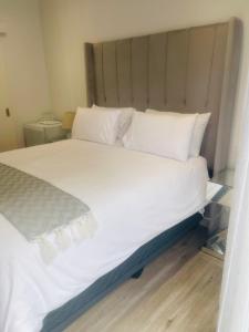 Ένα ή περισσότερα κρεβάτια σε δωμάτιο στο Private Luxury Room by 29 Holborn