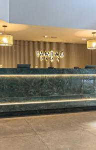 a building with the words tamago on the wall at HOTEL TAMBAÚ FLAT EXCLUSIVE apt particular in João Pessoa +31 photos