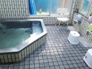 A bathroom at Hotel New Koyo