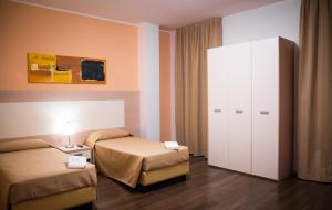 Postel nebo postele na pokoji v ubytování Groane Hotel Residence + 37 fotografií