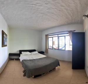 Postel nebo postele na pokoji v ubytování Casa campestre Finca la Roca