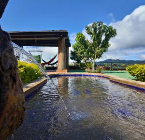 Bazén v ubytování Casa campestre Finca la Roca nebo v jeho okolí