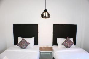 Postel nebo postele na pokoji v ubytování Non Du Lay Guesthouse