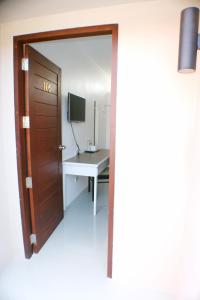TV a/nebo společenská místnost v ubytování Non Du Lay Guesthouse