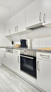 Kuchyň nebo kuchyňský kout v ubytování Design-Apartment II Boxspring I Nespresso I Balkon I Basel 10 km I Tiefgarage + 22 fotografií