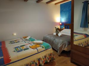 A bed or beds in a room at Apartaments Arenys De Boi