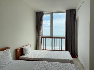 Postel nebo postele na pokoji v ubytování Sơn Thịnh - Oasky 36 + 18 fotografií