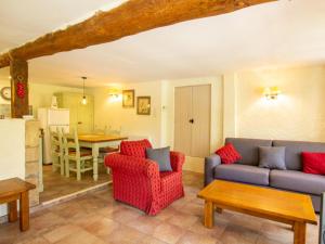 a living room with a couch and chairs and a table at Maison de charme avec jardin clos et Wifi au cœur du Périgord Noir - FR-1-616-401 in Saint-Pompont +7 photos