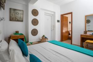 Postel nebo postele na pokoji v ubytování Lardos Sun View Apartments