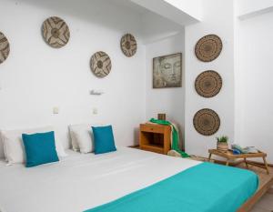 Postel nebo postele na pokoji v ubytování Lardos Sun View Apartments