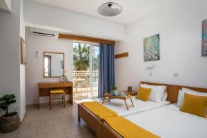 Postel nebo postele na pokoji v ubytování Lardos Sun View Apartments