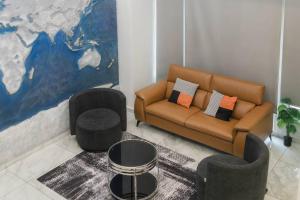 Uma área de estar em Georgetown Karpal Singh Getaway 4BR 娱乐设施洋房乔治市