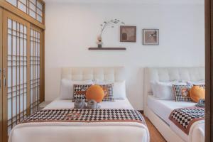 Uma cama ou camas num quarto em Georgetown Karpal Singh Getaway 4BR 娱乐设施洋房乔治市