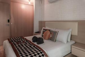 Uma cama ou camas num quarto em Georgetown Karpal Singh Getaway 4BR 娱乐设施洋房乔治市