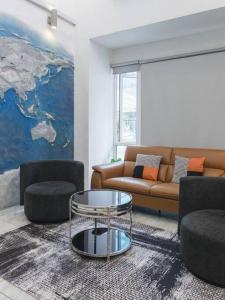 Uma área de estar em Georgetown Karpal Singh Getaway 4BR 娱乐设施洋房乔治市
