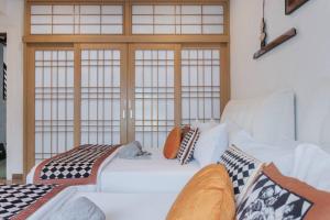 Uma cama ou camas num quarto em Georgetown Karpal Singh Getaway 4BR 娱乐设施洋房乔治市